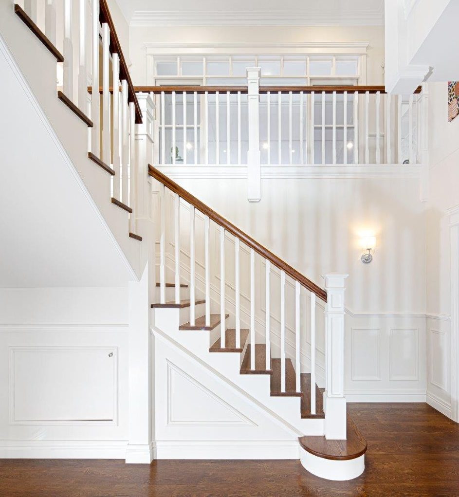 Hampton staircase with timber treads and white balustrade in Wavell Heights home