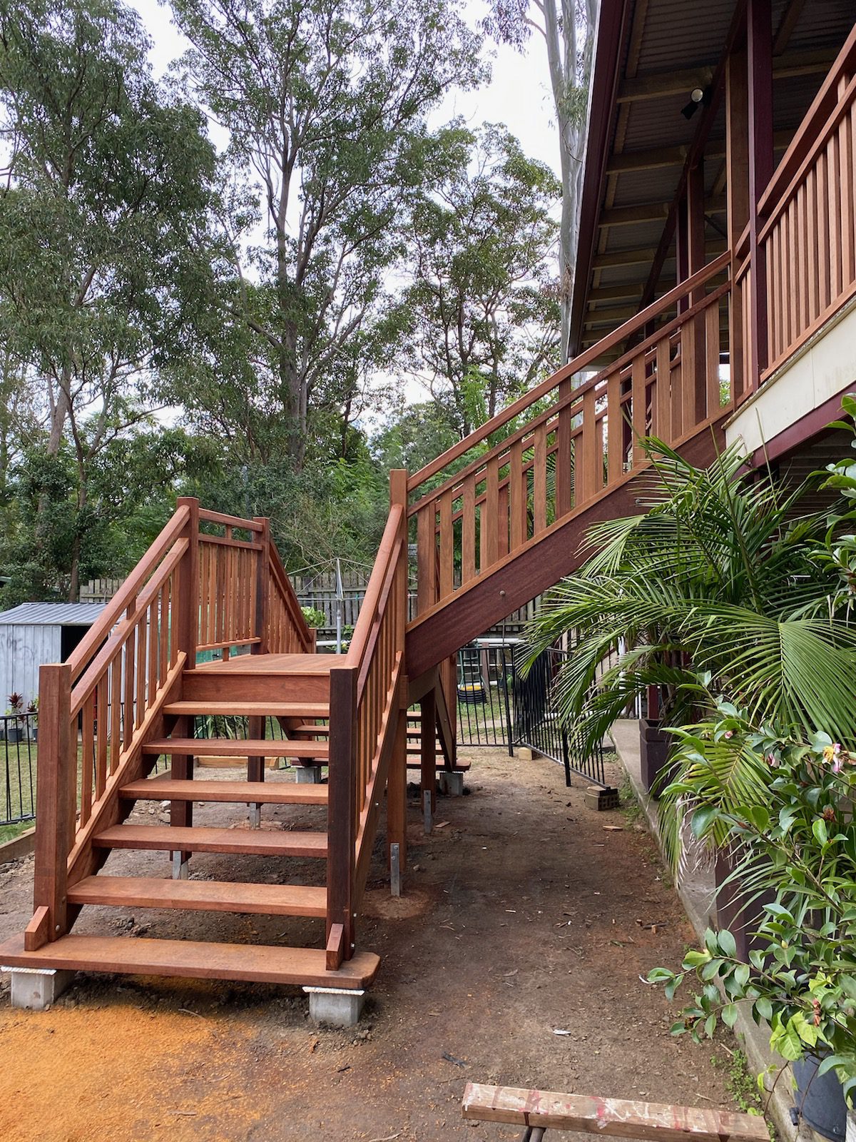 Hardwood external staircase with timber balustrade on Queenslander home near Bellmere