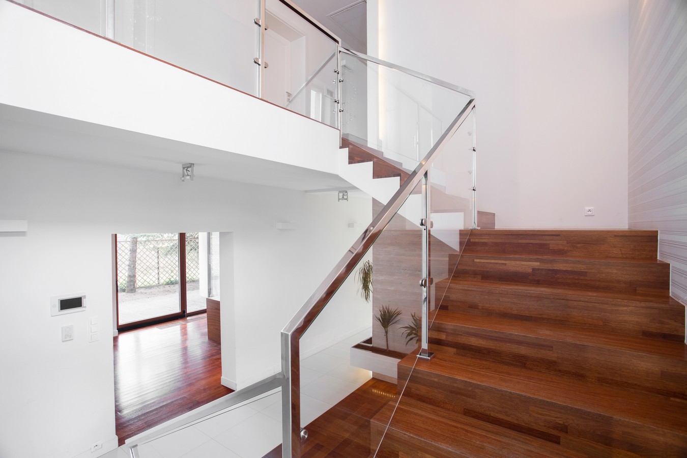 Hardwood staircase with glass balustrade in Caboolture South home