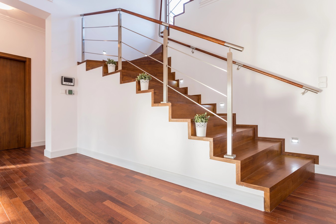 Hardwood staircase with steel rod balustrade in Banyo home