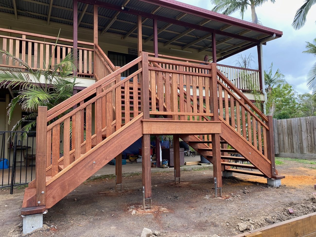 U-shaped hardwood external staircase with landing platform near Linville